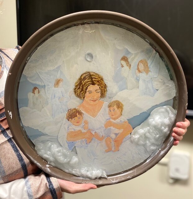 Painting of angel with babies