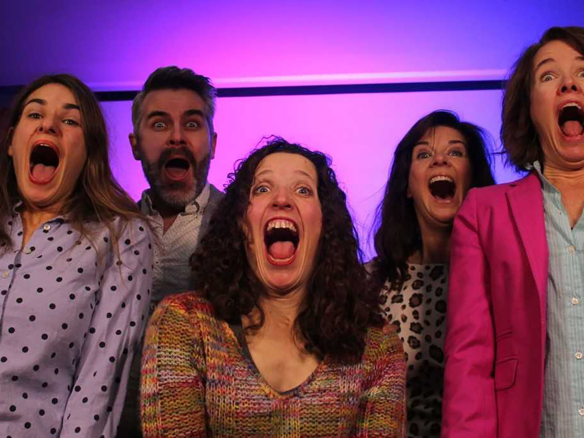 Winooski Coordinator of Academic Services Marianne DiMascio, center, who co-writes and co-produces sketch comedy with fellow Winooski Coordinator of Academic Services Angie Albeck, will perform a new show with their troupe Stealing from Work.