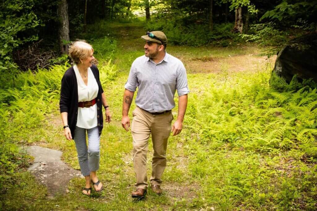 Anne Black and Kyle Aines walk together at The Warrior Connection.