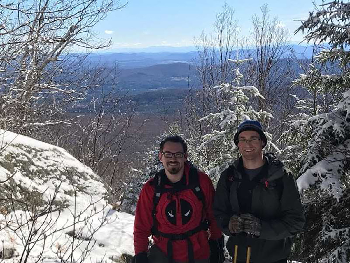 Montpelier students Ryan May, left, and Evan Spencer hiked Mt. Hunger last week to raise awareness for the center's food drive.