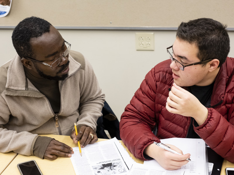 Students work on an assignment in the fall 2018 English for Academic Purposes class in Winooski.