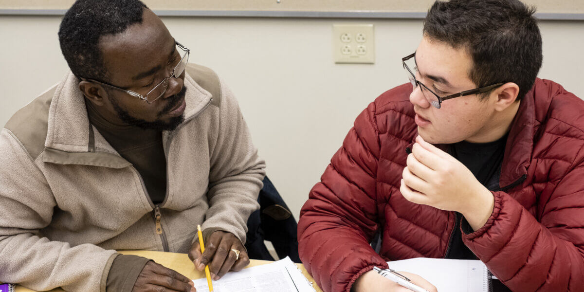 Students work on an assignment in the fall 2018 English for Academic Purposes class in Winooski.