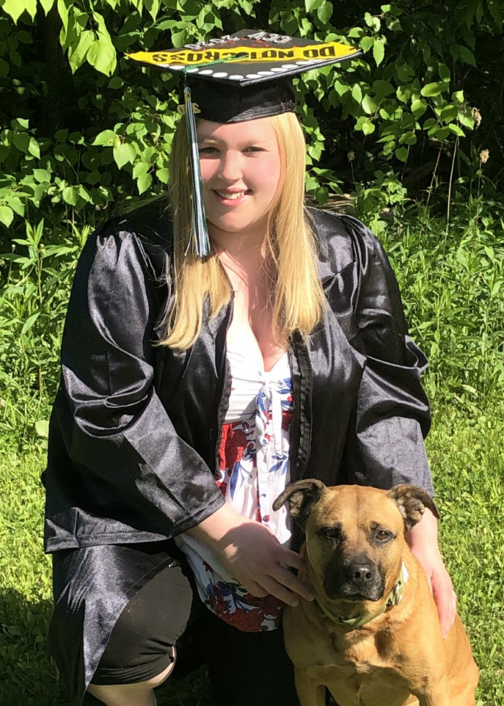 CCV Alumni Scholarship recipient Kaleigh Nutting poses with Pup Pup in celebration of her graduation. Nutting will continue her studies at Northern Vermont University.