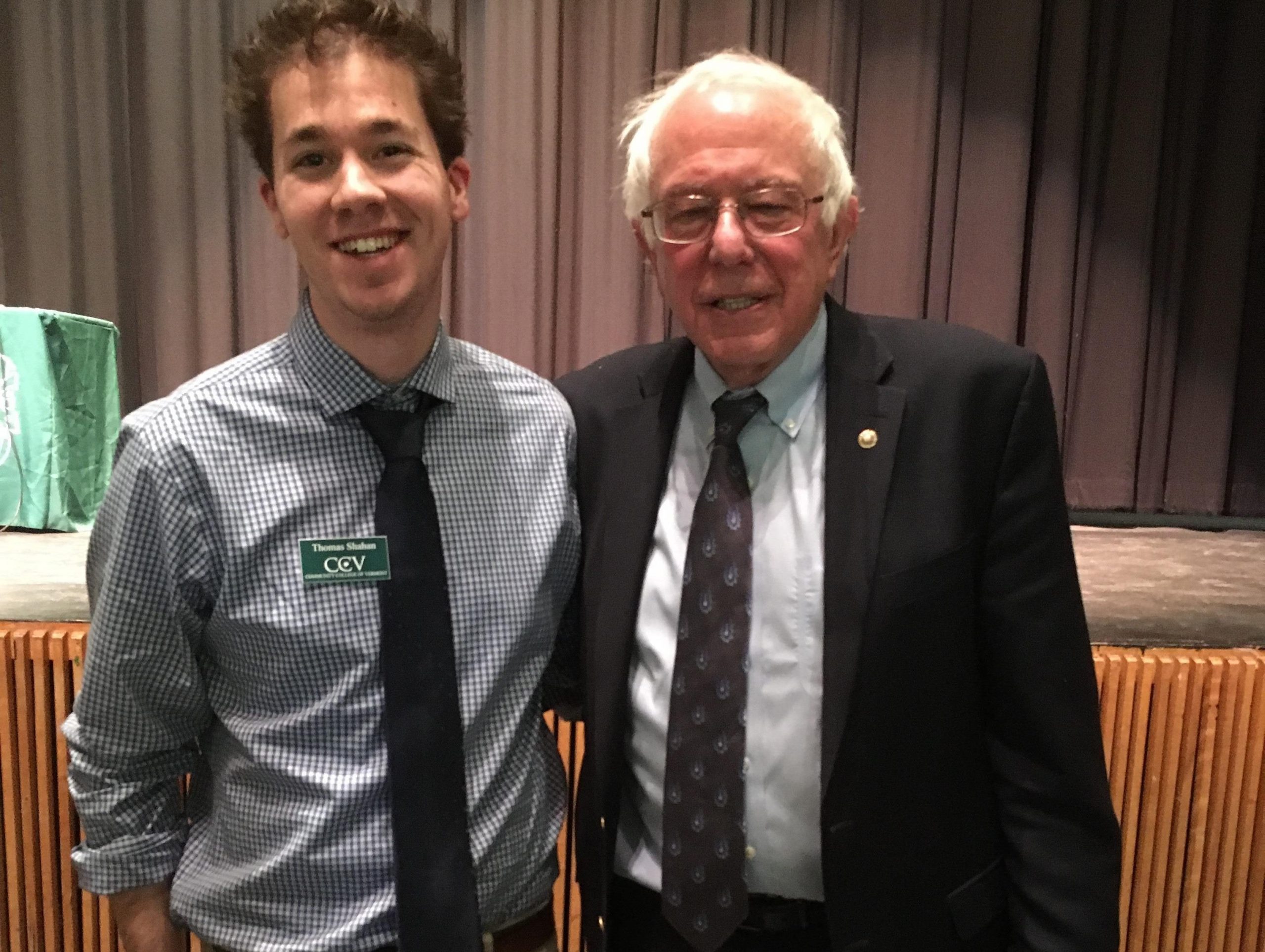 Social Media Specialist Tom Shahan gets some love from Bernie at the Springfield College and Career Fair.