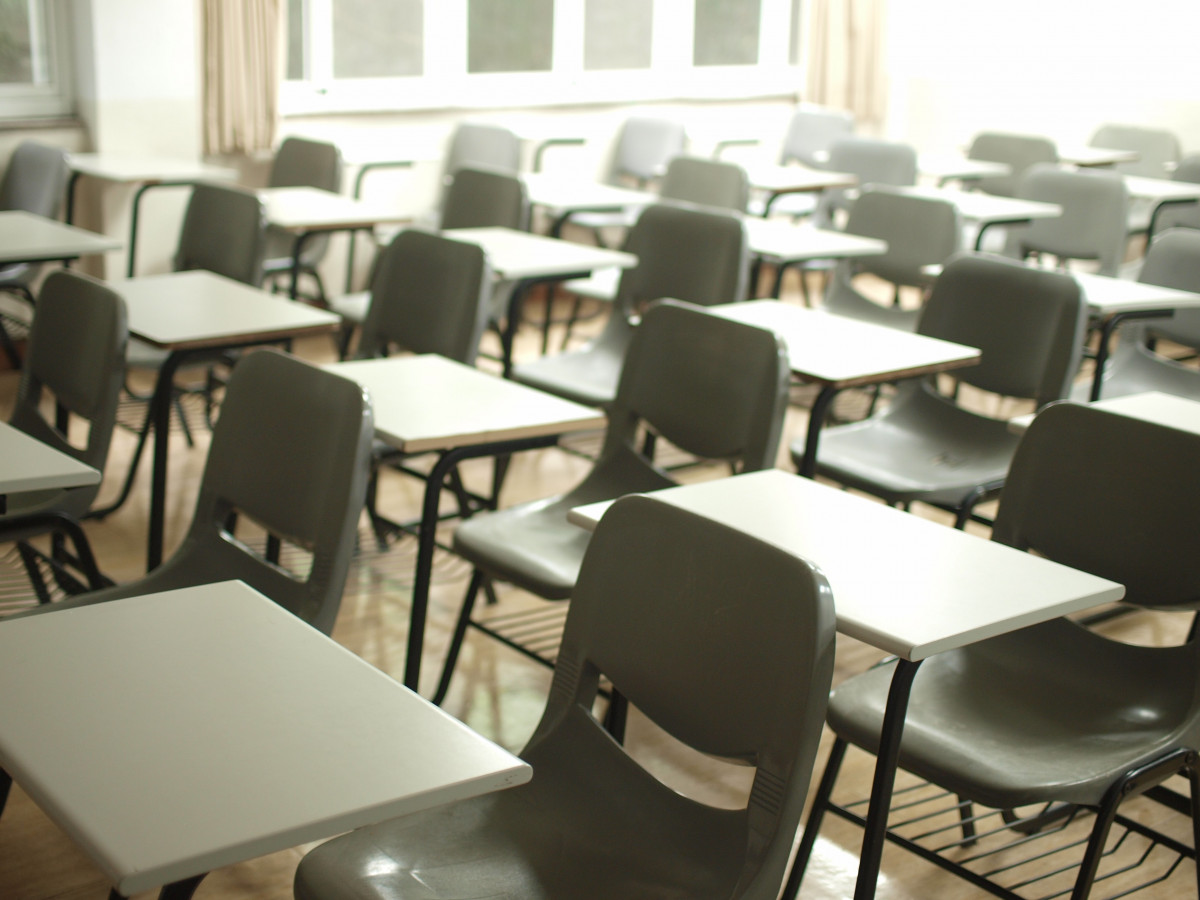 desks and chairs in an empty classroom