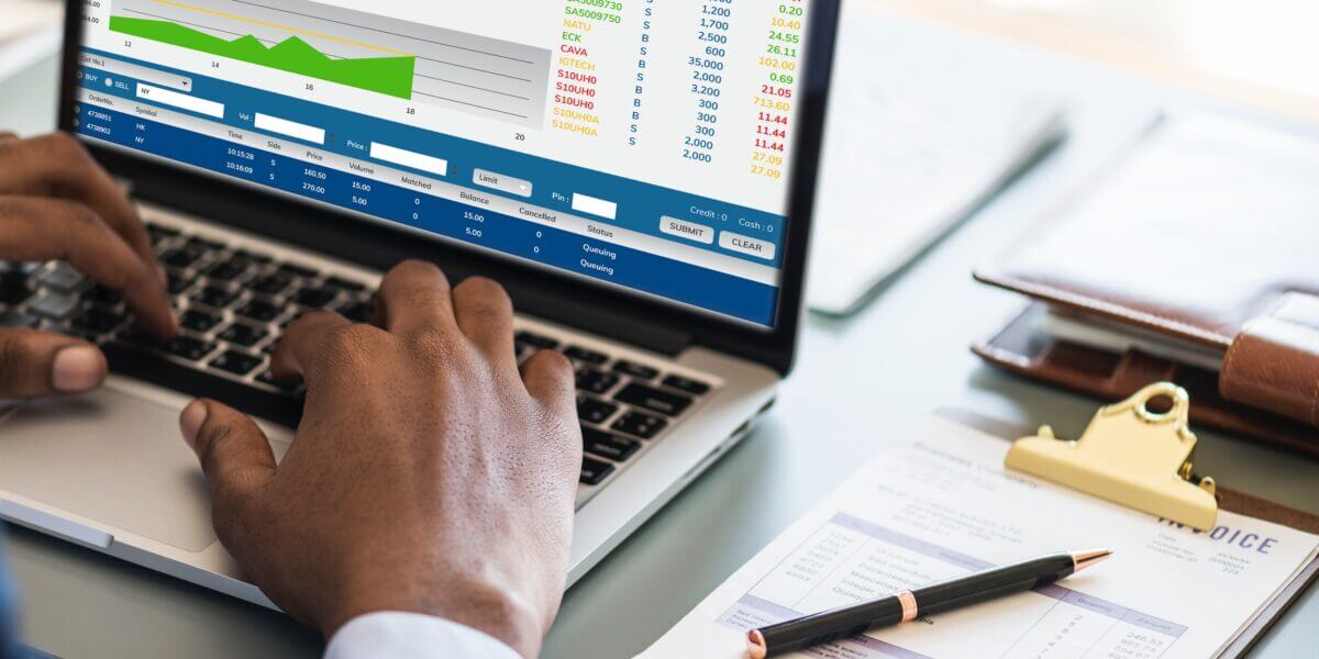 accounting on laptop, hands on laptop