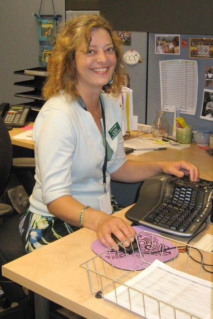 Karen Geiger at desk