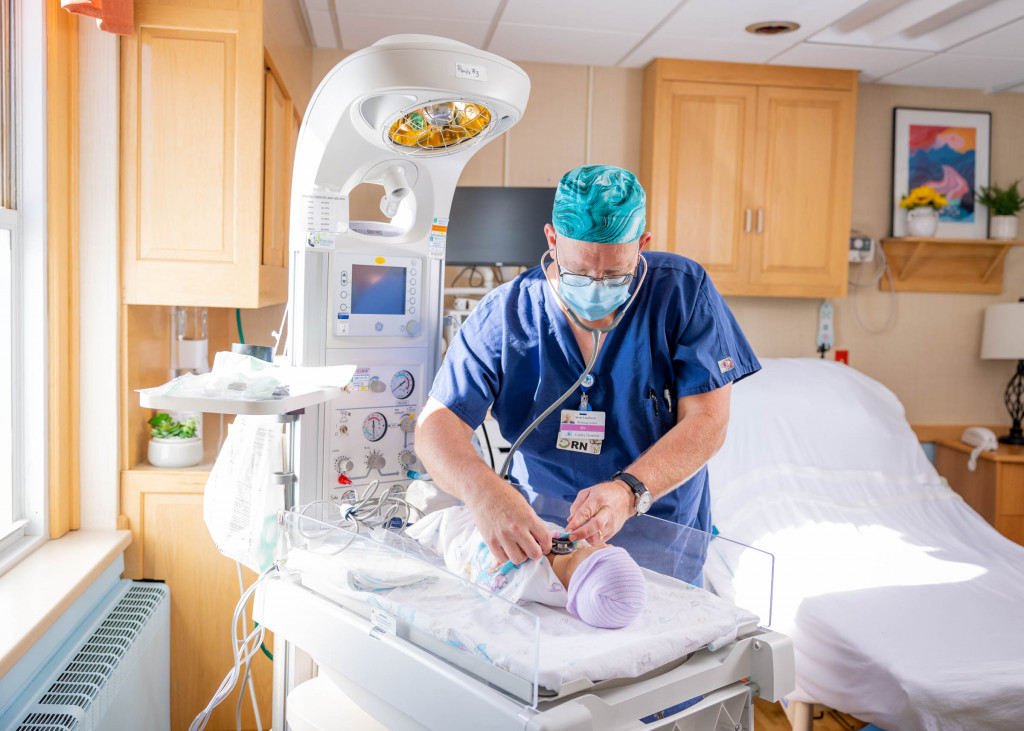 Scott Lamberti in hospital room monitoring baby