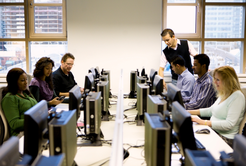 Students in a computer lab classroom.