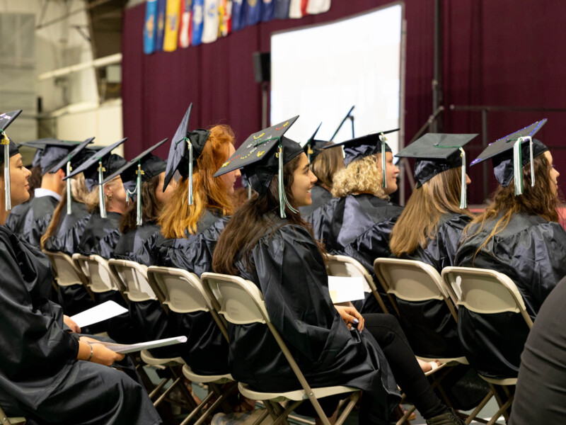 Graduates sitting in seats