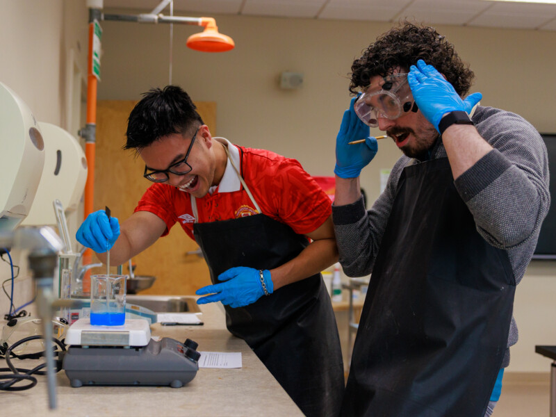 Two students in a chemistry lab