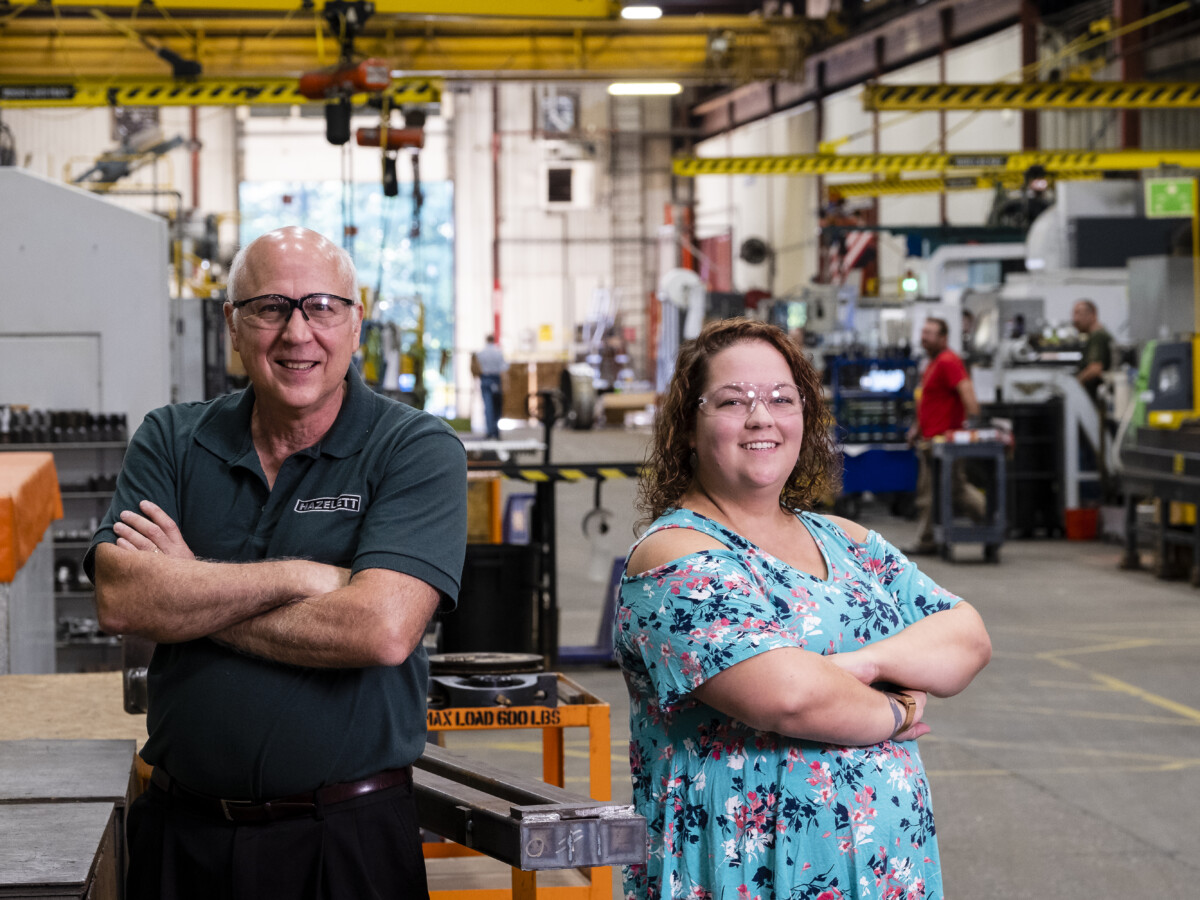 Employees in manufacturing setting.