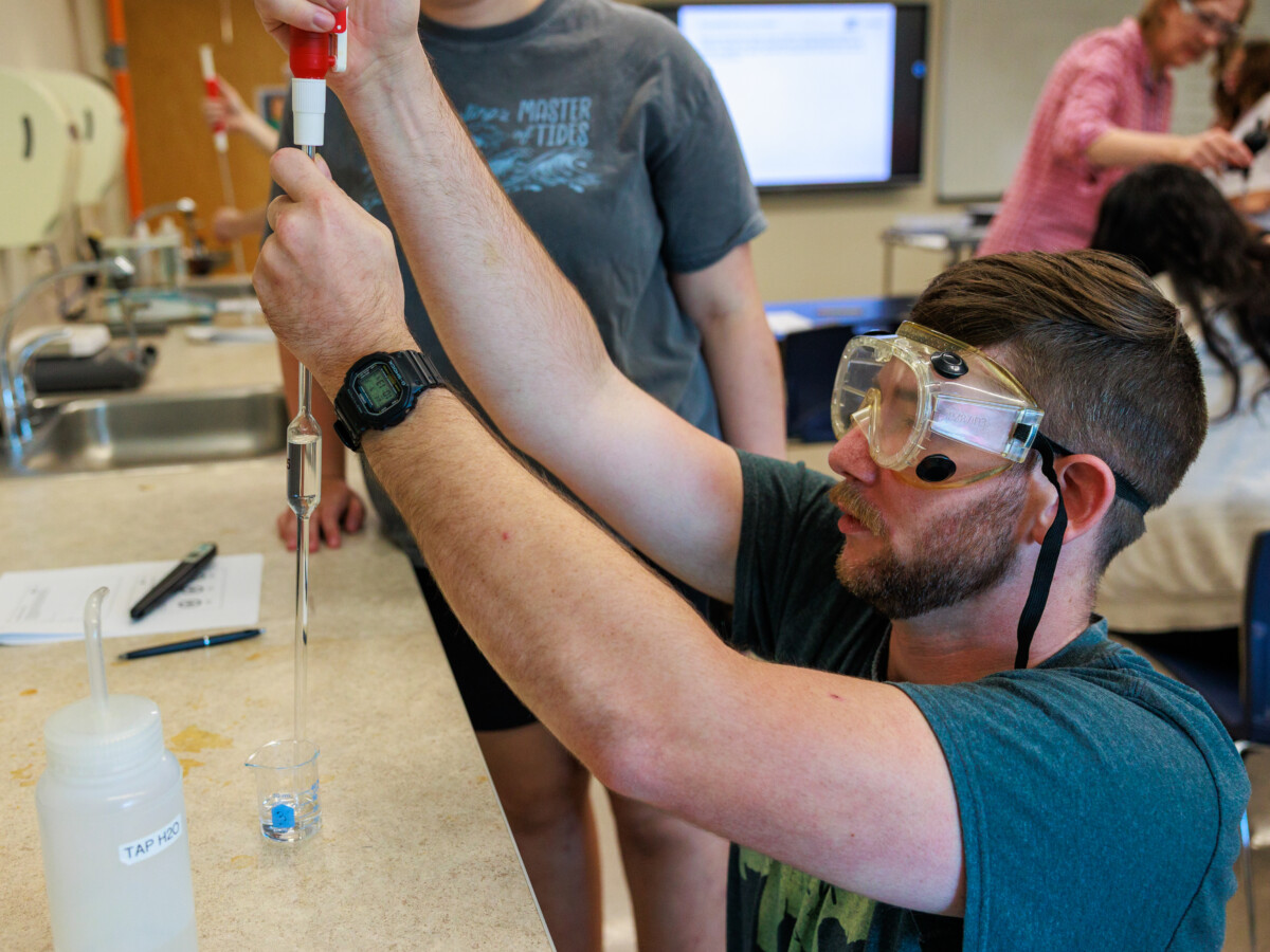 Student in a chemistry classroom.