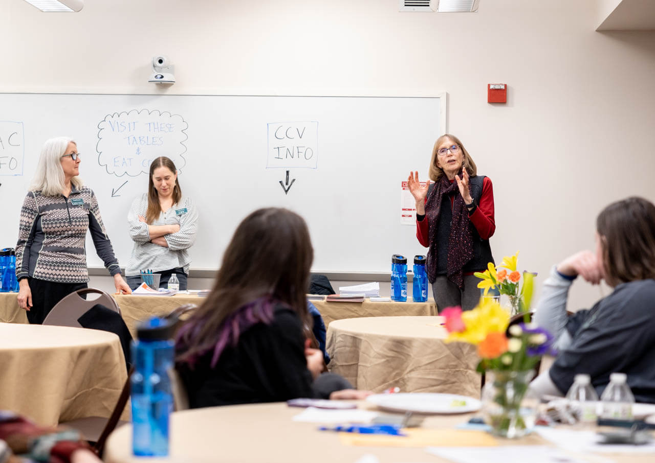 CCV President Joyce Judy welcomes students to Montpelier's Mac & Cheese Social. 