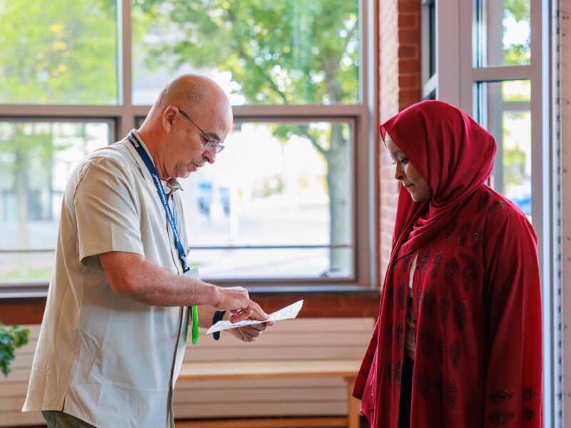 CCV staff talking with student
