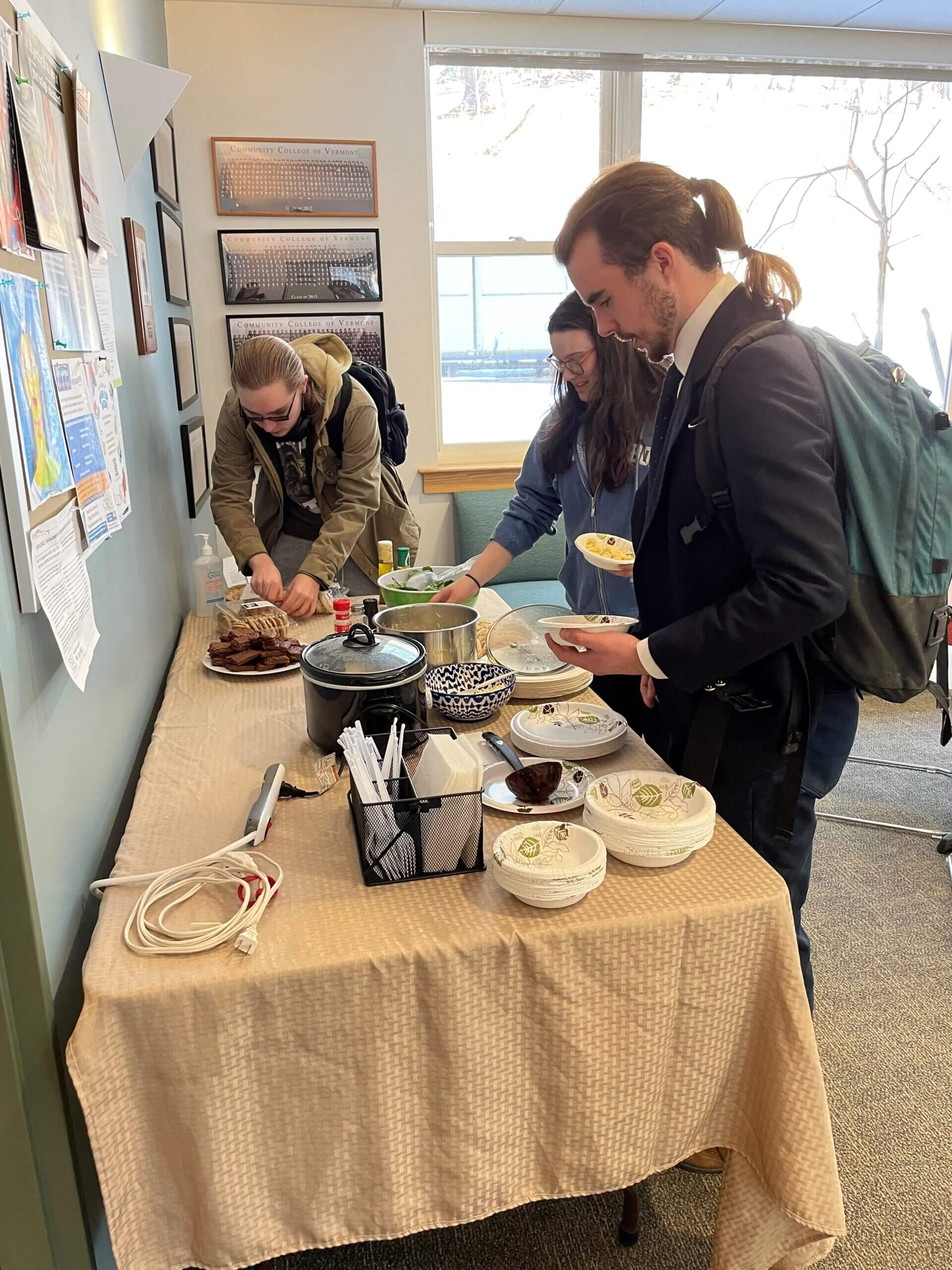 Table with food and students eating