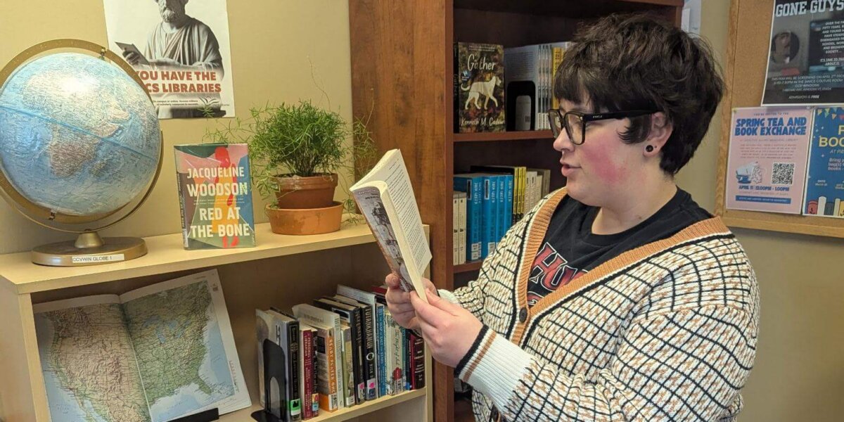 Student reading a book